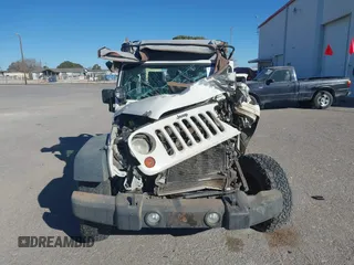 2010 Jeep Wrangler Mountain with VIN 1J4AA2D14AL173286, listed as a IAAI auction lot 41661821 with Not Provided miles and . Bid and sale history available at carsss.com. Image 12.