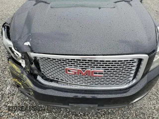 2016 GMC Yukon XL Denali with VIN 1GKS2HKJ1GR199710, listed as a Copart auction lot 49172615 with 261,856 mi miles and Salvage Title. Bid and sale history available at DreamBid. Image 13.