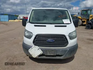 2015 Ford Transit Cargo z VIN 1FTNE1YM7FKB14241, wystawiony jako IAAI lot #42126200 z przebiegiem 314 744 mil mil oraz . Historia ofert i sprzedaży dostępna na DreamBid. Obrazek 13.