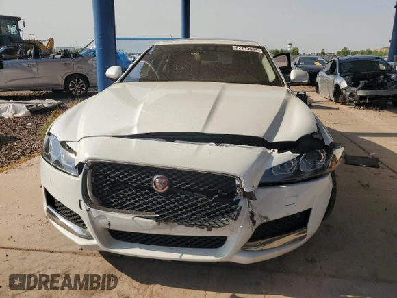 2018 Jaguar XF 25t with VIN SAJBR4FX8JCY69487, listed as a Copart auction lot 62713694 with 62,598 mi miles and Salvage Title. Bid and sale history available at carsss.com. Image 5.