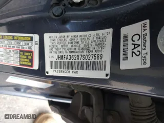 2007 Honda Civic Hybrid with VIN JHMFA362X7S027589, listed as a IAAI auction lot 42016320 with 181,110 mi miles. Bid and sale history available at carsss.com. Image 9.