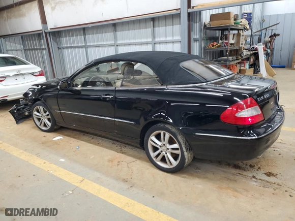 2006 Mercedes-Benz CLK-Class 3.5L with VIN WDBTK56J66F169464, listed as a Copart auction lot 86990314 with 173,705 mi miles and Salvage Title. Bid and sale history available at carsss.com. Image 2.