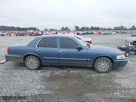 2007 Mercury Grand Marquis GS with VIN 2MEFM74V27X609128, listed as a IAAI auction lot 41474359 with 99,050 mi miles. Bid and sale history available at carsss.com. Image 13.