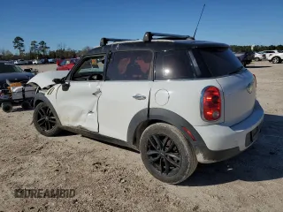 2011 MINI Countryman with VIN WMWZB3C59BWH94541, listed as a Copart auction lot 87177514 with 186,979 mi miles and Salvage title. Bid and sale history available at DreamBid. Image 2.