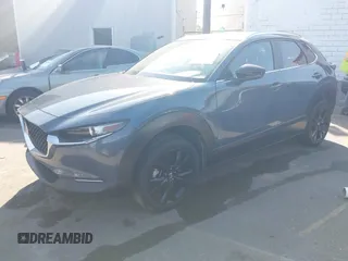 2022 Mazda CX-30 S Carbon Edition with VIN 3MVDMBCL6NM431985, listed as a IAAI auction lot 42610558 with Not provided miles and . Bid and sale history available at DreamBid. Image 16.