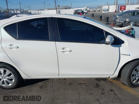 2014 Toyota Prius One with VIN JTDKDTB38E1575308, listed as a IAAI auction lot 40787857 with 70,891 mi miles and . Bid and sale history available at DreamBid. Image 13.