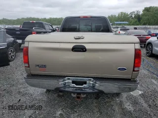 2002 Ford F-150 XL with VIN 1FTRX18L02NA58574, listed as a Copart auction lot 57156255 with 291,950 mi miles and Salvage title. Bid and sale history available at DreamBid. Image 6.