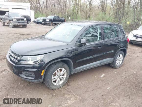 2012 Volkswagen Tiguan SE with VIN WVGAV7AX7CW609609, listed as a IAAI auction lot 41947280 with 77,942 mi miles and . Bid and sale history available at DreamBid. Image 2.