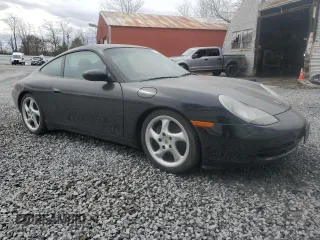 1999 Porsche 911 z VIN WP0AA2994XS625367, wystawiony jako Copart lot #51925145 z przebiegiem 70 486 mil mil oraz Szkoda całkowita • Salvage title. Historia ofert i sprzedaży dostępna na DreamBid. Obrazek 4.