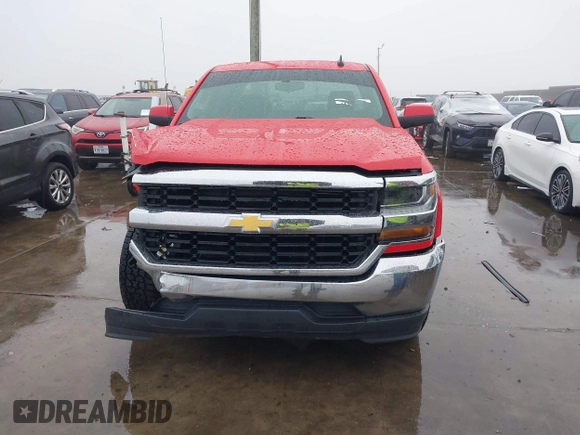 2018 Chevrolet Silverado 1500 LT with VIN 1GCRCREC1JZ342110, listed as a IAAI auction lot 41194372 with 73,186 mi miles and . Bid and sale history available at DreamBid. Image 13.