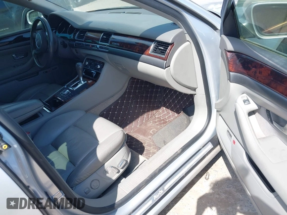 2004 Audi A8 with VIN WAUML44E74N000587, listed as a IAAI auction lot 42479262 with 100,722 mi miles and . Bid and sale history available at DreamBid. Image 5.