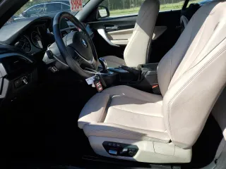 2016 BMW 2 Series 228i with VIN WBA1K9C50GV710942, listed as a Copart auction lot 77700934 with 28,643 mi miles and Salvage Title. Bid and sale history available at carsss.com. Image 7.