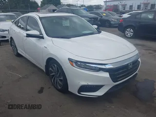 2019 Honda Insight Touring with VIN 19XZE4F91KE007748, listed as a IAAI auction lot 40233174 with 78,036 mi miles and . Bid and sale history available at DreamBid. Image 1.