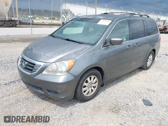 2010 Honda Odyssey EX-L with VIN 5FNRL3H68AB039883, listed as a IAAI auction lot 42000686 with 231,642 mi miles. Bid and sale history available at carsss.com. Image 2.