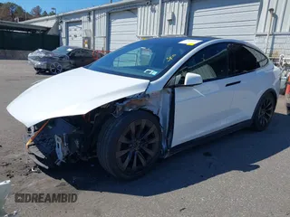 2022 Tesla Model X with VIN 7SAXCDE58NF342776, listed as a IAAI auction lot 42042369 with 70,301 mi miles and . Bid and sale history available at carsss.com. Image 2.
