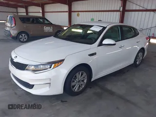 2016 Kia Optima LX with VIN KNAGT4L34G5105864, listed as a IAAI auction lot 42161194 with 106,351 mi miles. Bid and sale history available at carsss.com. Image 17.