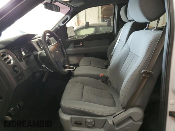 2014 Ford F-150 XL with VIN 1FTFW1ET5EFB75690, listed as a Copart auction lot 47824635 with 194,649 mi miles and Salvage Title. Bid and sale history available at carsss.com. Image 7.