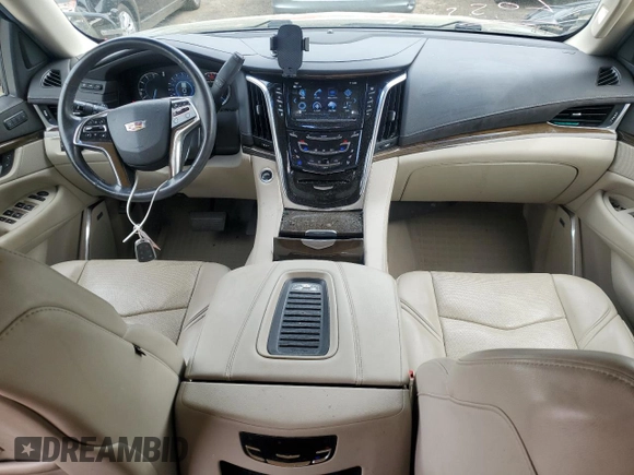 2020 Cadillac Escalade Luxury with VIN 1GYS4BKJ2LR101971, listed as a Copart auction lot 58312245 with 58,069 mi miles and Salvage title. Bid and sale history available at DreamBid. Image 8.