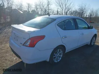 2016 Nissan Versa SV with VIN 3N1CN7AP8GL903922, listed as a IAAI auction lot 41765631 with 144,113 mi miles. Bid and sale history available at carsss.com. Image 4.