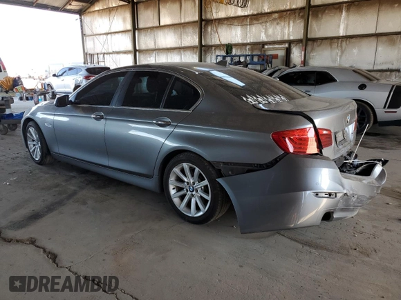 2014 BMW 5 Series 535d with VIN WBAXA5C50ED690264, listed as a Copart auction lot 51329235 with 123,946 mi miles and Salvage Title. Bid and sale history available at carsss.com. Image 2.