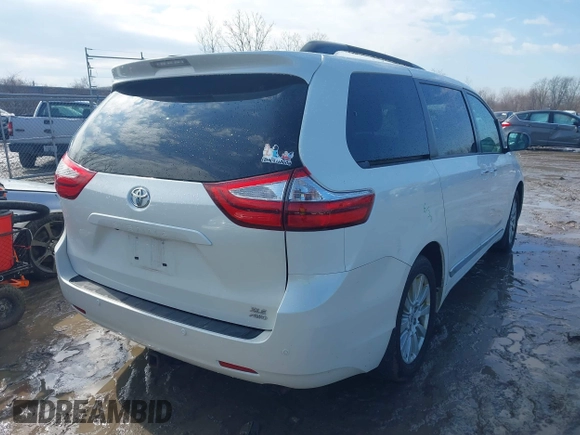 2017 Toyota Sienna XLE with VIN 5TDDZ3DC3HS171251, listed as a IAAI auction lot 41637035 with 124,127 mi miles and . Bid and sale history available at DreamBid. Image 4.