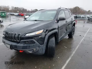 2016 Jeep Cherokee Trailhawk with VIN 1C4PJMBS5GW304062, listed as a IAAI auction lot 41756813 with 112,671 mi miles. Bid and sale history available at carsss.com. Image 19.
