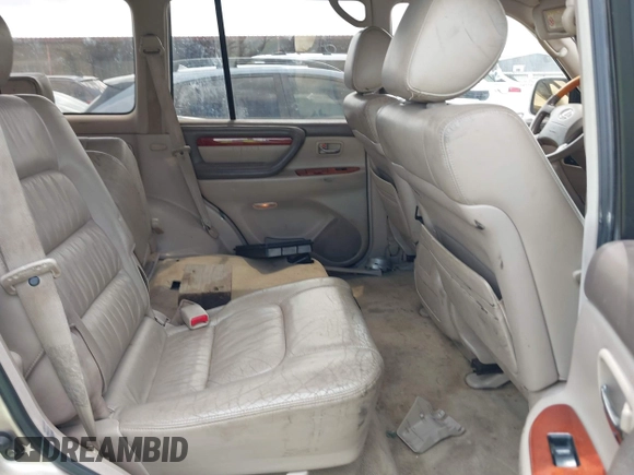 2001 Lexus LX 470 with VIN JTJHT00W713511796, listed as a IAAI auction lot 42222574 with 297,427 mi miles and . Bid and sale history available at carsss.com. Image 8.