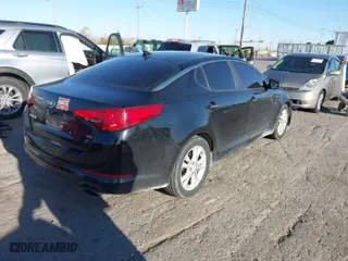 2013 Kia Optima LX with VIN 5XXGM4A72DG141842, listed as a IAAI auction lot 41758919 with 153,114 mi miles. Bid and sale history available at carsss.com. Image 4.