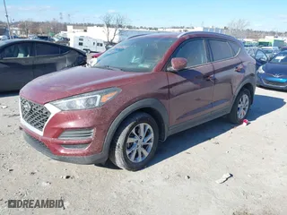 2020 Hyundai Tucson Value with VIN KM8J3CA42LU149811, listed as a IAAI auction lot 41642255 with 60,936 mi miles. Bid and sale history available at carsss.com. Image 2.