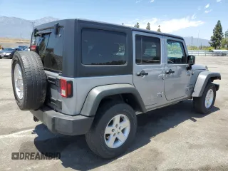 2014 Jeep Wrangler Unlimited Sport with VIN 1C4HJWDG1EL221302, listed as a Copart auction lot 63331015 with 213,912 mi miles and Salvage title. Bid and sale history available at DreamBid. Image 3.
