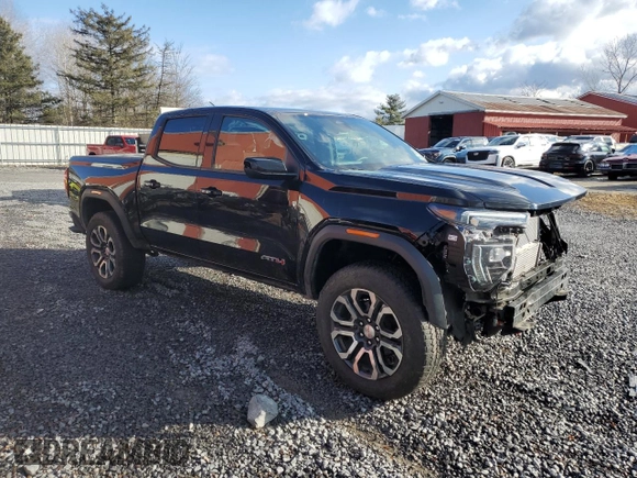 2024 GMC Canyon 4WD AT4 with VIN 1GTP6DEK2R1180037, listed as a Copart auction lot 85656994 with 7,565 mi miles and Salvage Title. Bid and sale history available at carsss.com. Image 4.