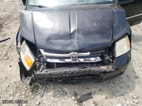 2010 Dodge Grand Caravan SXT with VIN 2D4RN5D12AR444791, listed as a Copart auction lot 77529904 with 149,676 mi miles and Salvage Title. Bid and sale history available at carsss.com. Image 13.