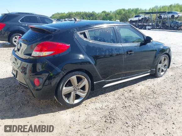 2013 Hyundai Veloster Turbo w/Black Int with VIN KMHTC6AE8DU175611, listed as a IAAI auction lot 42057549 with 137,929 mi miles. Bid and sale history available at carsss.com. Image 4.