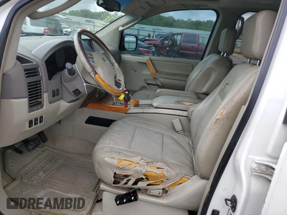 2004 Infiniti QX56 with VIN 5N3AA08C04N807761, listed as a Copart auction lot 64402414 with 272,393 mi miles and Salvage Title. Bid and sale history available at carsss.com. Image 7.