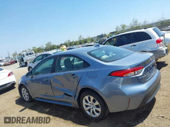 2023 Toyota Corolla LE with VIN 5YFB4MDE9PP052382, listed as a IAAI auction lot 42087565 with 41,170 mi miles and . Bid and sale history available at DreamBid. Image 14.