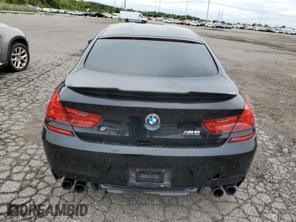 2015 BMW M6 z VIN WBS6C9C59FD467652, wystawiony jako Copart lot #66093293 z przebiegiem Nie podano mil oraz . Historia ofert i sprzedaży dostępna na DreamBid. Obrazek 6.