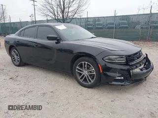 2019 Dodge Charger SXT with VIN 2C3CDXJG7KH757728, listed as a IAAI auction lot 41797017 with 68,063 mi miles and . Bid and sale history available at DreamBid. Image 1.