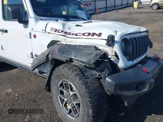 2024 Jeep Wrangler Rubicon with VIN 1C4PJXFG9RW307699, listed as a IAAI auction lot 42047562 with Not Provided miles. Bid and sale history available at carsss.com. Image 6.