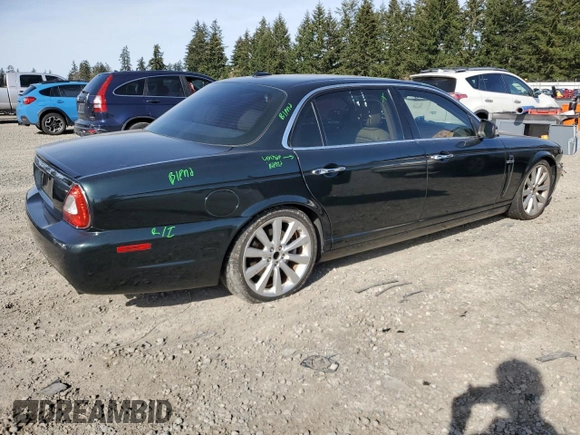 2008 Jaguar XJ with VIN SAJWA79BX8SH23430, listed as a Copart auction lot 51990785 with 140,454 mi miles and Salvage Title. Bid and sale history available at carsss.com. Image 3.