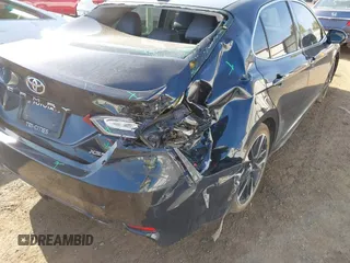 2020 Toyota Camry XSE with VIN 4T1K61AK0LU320375, listed as a IAAI auction lot 42126158 with 99,470 mi miles and . Bid and sale history available at DreamBid. Image 6.