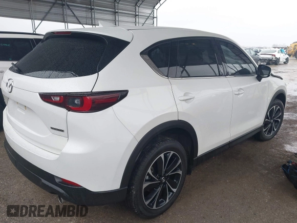 2023 Mazda CX-5 2.5 S Premium Package with VIN JM3KFBDM7P0165562, listed as a IAAI auction lot 41458088 with 35,168 mi miles. Bid and sale history available at carsss.com. Image 4.