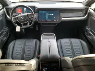 2022 Rivian R1T Adventure z VIN 7FCTGAAA9NN014280, wystawiony jako Copart lot #87908175 z przebiegiem 28 601 mil mil oraz Szkody całkowita. Historia ofert i sprzedaży dostępna na DreamBid. Obrazek 8.