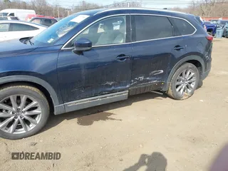 2021 Mazda CX-9 Grand Touring with VIN JM3TCBDY7M0540359, listed as a IAAI auction lot 41711366 with 47,391 mi miles and . Bid and sale history available at carsss.com. Image 6.