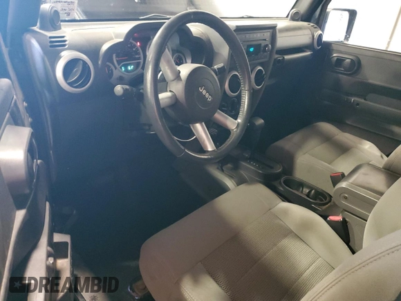 2008 Jeep Wrangler Sahara с VIN 1J8FA54168L613041, выставлен на аукционе Copart как лот 46603275 с пробегом 118 849 миль миль и Списание • Salvage title. История ставок и продаж доступна на DreamBid. Изображение 8.