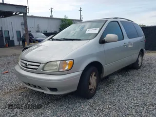 2002 Toyota Sienna LE with VIN 4T3ZF13C92U434076, listed as a IAAI auction lot 42132585 with 243,661 mi miles and . Bid and sale history available at DreamBid. Image 2.