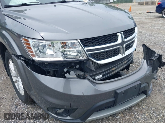 2013 Dodge Journey SXT with VIN 3C4PDCBG8DT517733, listed as a IAAI auction lot 42737063 with 67,363 mi miles and . Bid and sale history available at DreamBid. Image 13.