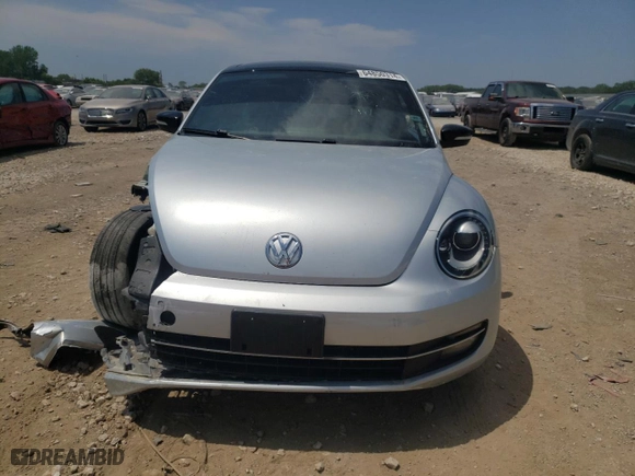 2012 Volkswagen Beetle 2.0T Turbo w/Sun/Sound PZEV with VIN 3VWVA7AT7CM664802, listed as a Copart auction lot 64850314 with 102,107 mi miles and Salvage Title. Bid and sale history available at carsss.com. Image 5.