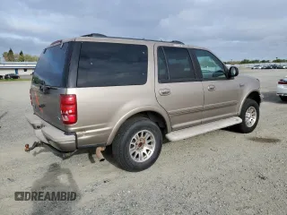 2001 Ford Expedition Eddie Bauer with VIN 1FMPU18L31LB70212, listed as a Copart auction lot 50969355 with 100,311 mi miles and Clean title. Bid and sale history available at DreamBid. Image 3.