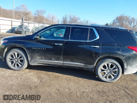 2018 Chevrolet Traverse Premier z VIN 1GNEVJKW5JJ174261, wystawiony jako IAAI lot #41656906 z przebiegiem 101 908 mil mil oraz . Historia ofert i sprzedaży dostępna na DreamBid. Obrazek 14.