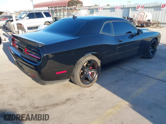 2021 Dodge Challenger SRT Hellcat with VIN 2C3CDZC97MH634623, listed as a IAAI auction lot 41228580 with 36,027 mi miles and . Bid and sale history available at DreamBid. Image 4.